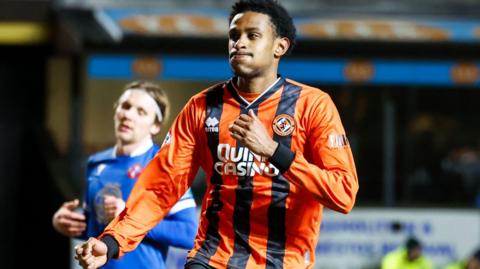 Dundee United's Amar Fatah celebrates his goal