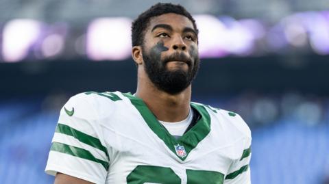 Qwan'tez Stiggers of the New York Jets looks on as he walks off the field following an NFL game against the Baltimore Ravens