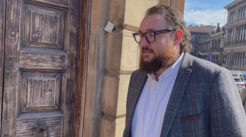 Nathan Sparling arriving at court in Edinburgh.