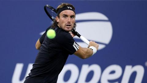 Stefanos Tsitsipas hits a shot