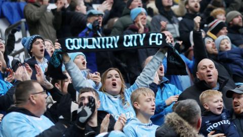 Coventry City fans celebrate during the Sky Bet Championship match at Coventry Building Society Arena,