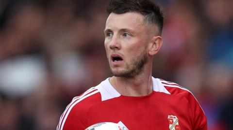 Ollie Clarke playing for Swindon Town