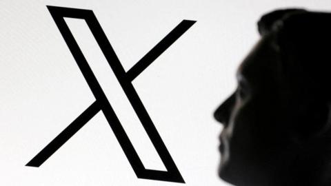 A 3D-printed miniature model of Elon Musk and the X logo are seen in this illustrative photo.