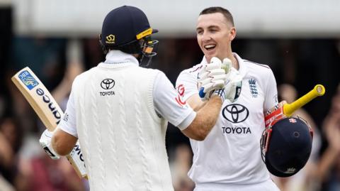 England's Harry Brook and Joe Root celebrate the former's century against India in the fifth Test at The Oval