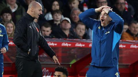 Nottingham Forest head coach Sean Dyche complains to fourth official Bobby Madley during his side's 2-2 draw with Manchester United.