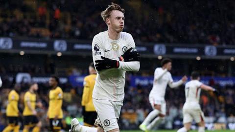 Cole Palmer celebrates scoring against Wolves