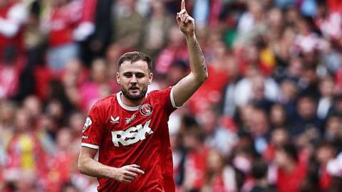 Macaulay Gillesphey celebrating his goal in the League One play-off final win over Leyton Orient last season