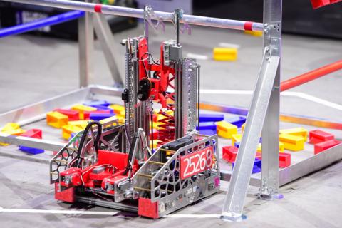 A silver and red robot 