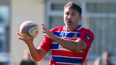 Gavin Henson in action for Pencoed against Heol-y-Cyw