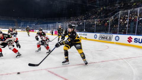 Ice hockey taking place at a test event at the Santagiulia Arena, which will be used during the Winter Olympics in Italy
