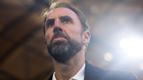 A head and shoulders picture of Gareth Southgate, shot from below, taken during England v Serbia at Euro 2024