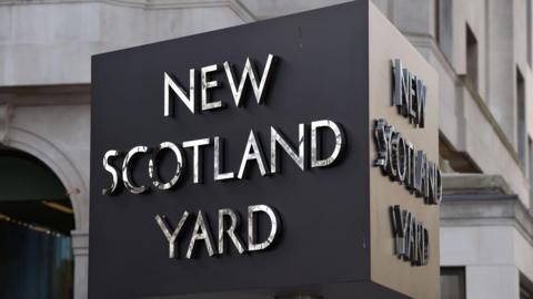 Sign reading 'New Scotland Yard'