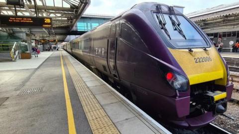 A train at a railway station platform