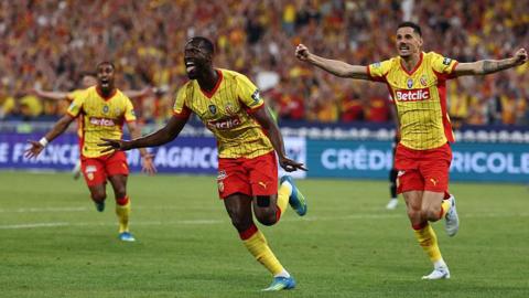 Lens players celebrate