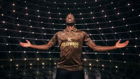 Brentford player wearing new away kit