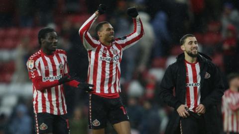 Wilson Isidor and Eliezer Mayenda celebrating a victory over Sheffield Wednesday