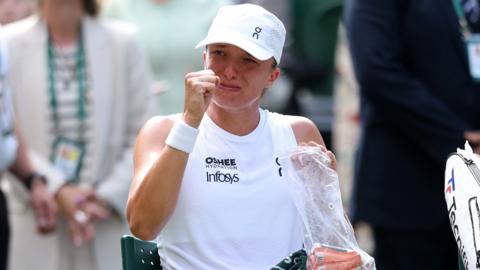 Iga Swiatek celebrates victory at Wimbledon