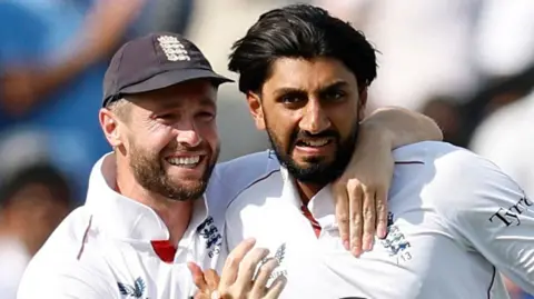 England bowler Brydon Carse  (left) exchanges words with India batter Ravindra Jadeja (right)