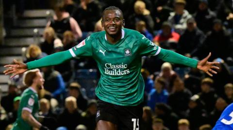 Mustapha Bundu celebrates his goal