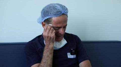 Eye surgeon Elias Jaradeh in hospital looking exhausted on 18 September