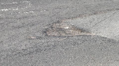A pothole.