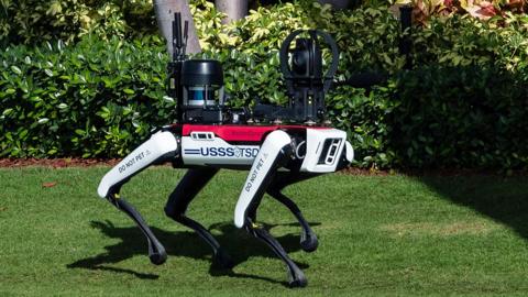 A futuristic-looking robotic dog made by Boston Dynamics patrols the grounds of President-elect Donald Trump's Florida residence