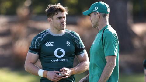 Garry Ringrose and Simon Easterby speak on the training field