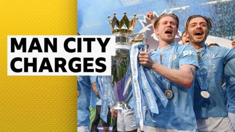 Manchester City lifting Premier League trophy