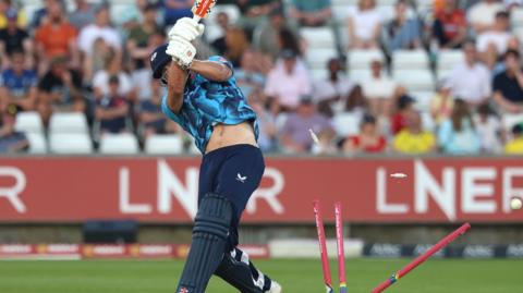 Will Sutherland is clean bowled by Jimmy Neesham