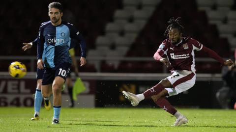 Kyle Edwards fires in a left-foot shot against Wycombe Wanderers
