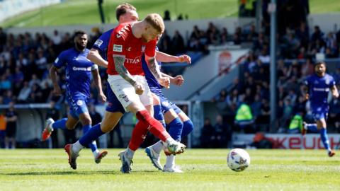 York's Josh Stones has a shot at goal