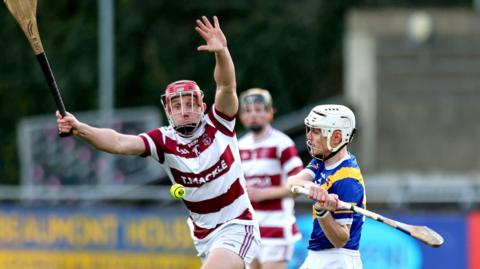 Slaughtneil’s Mark McGuigan and Brian Keary of Loughrea