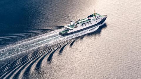 Stock image shows a ferry travelling in water