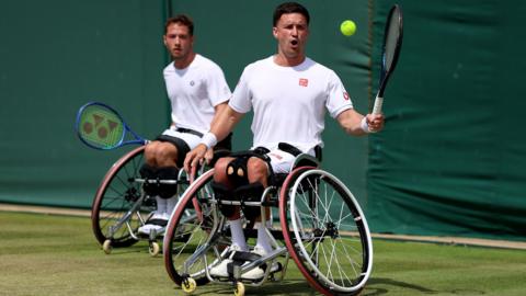 Alfie Hewett and Gordon Reid in wheelchair doubles action at Wimbledon