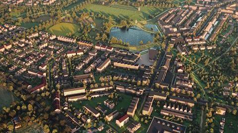 An aerial view of location of the solar farm in the village of Lympne, Kent. There are areas of greenery, as well as a series of houses. 