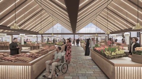 An artists impression of a busy market under a roof, with a man in a wheelchair buying fresh bread and a trader selling fruit and veg opposite