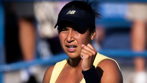 Heather Watson clenches her fist in celebration after winning a point in US Open qualifying