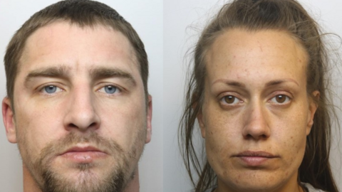 Police mugshots of a man and woman. The man has short dark hair and stubble, and the woman has long dark hair tied into a pony tail.