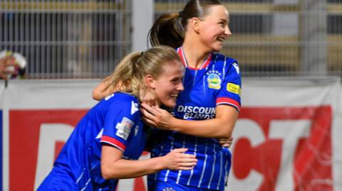 Cora Chambers celebrates