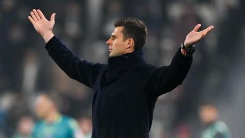 Thiago Motta reacts with raised arms during Juventus' match against Bologna