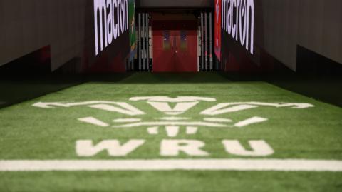 WRU logo on grass