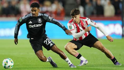 Ian Maatsen dribbles