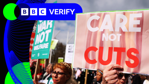 A woman holding a sign saying "care not cuts"