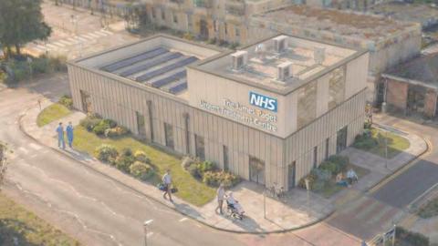 An artist's impression of the outside of a new facility at the James Paget Hospital in Gorleston set in grass and shrubs with visuals of patients and staff sitting outside and walking around. This facility would be connected to the main emergency department and would be called the Urgent Treatment Centre.