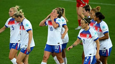 Ella Toone (centre) celebrates scoring against Wales