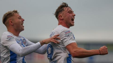 Matthew Shevlin celebrates scoring against Dungannon