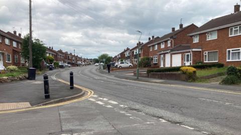 This generic photo shows Mount Pleasant Road running from the bottom right to around the middle of the image. Houses are to the left and right of the street and there is a junction with another road at the bottom of the photo.