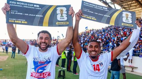 Roberto Lopes (left) celebrates Cape Verde's World Cup qualification with  Deroy Duarte after victory over Eswatini