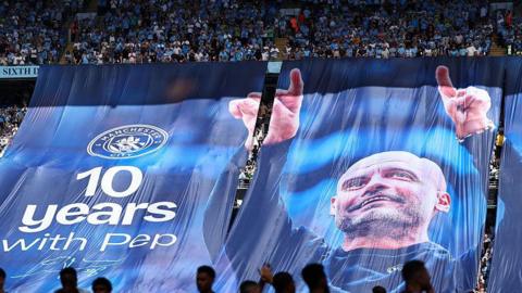 A banner at Etihad Stadium that reads "10 years with Pep"