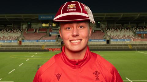 Nikita Prothero with her Wales cap on